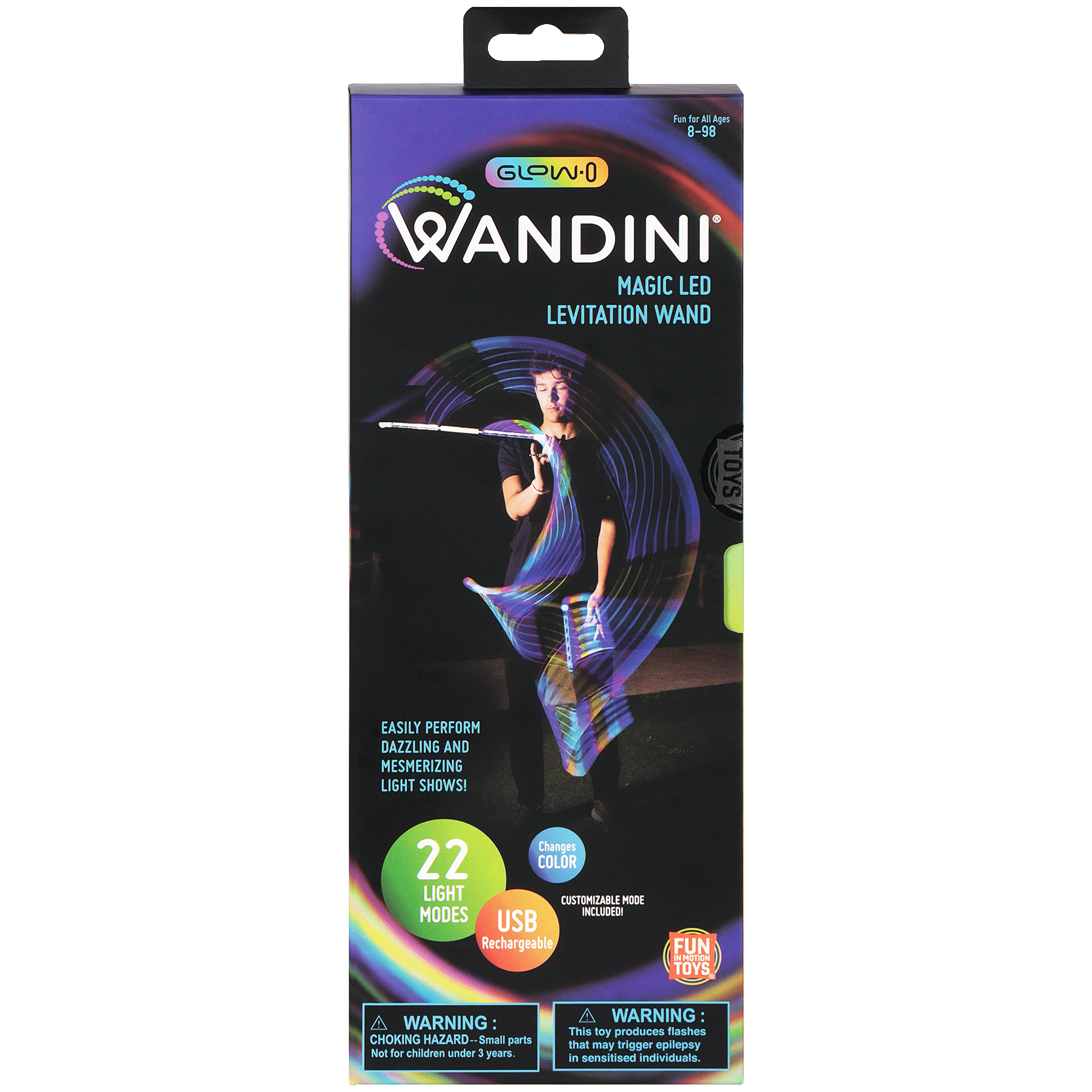 Product packaging for the Wandini Glow.0 Magic LED Levitation Wand, featuring a performer creating colorful light trails with the wand on the front. The packaging highlights the key features, including 22 light modes, customizable color modes, USB rechargeability, and a warning about the toy's flashing lights. Smaller images below show different views of the packaging, the LED light options, and the included accessories such as the wand, USB charging cable, and additional parts.