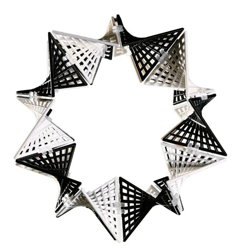 Black and white HyperTiles star-shaped geometric structure, highlighting design versatility.